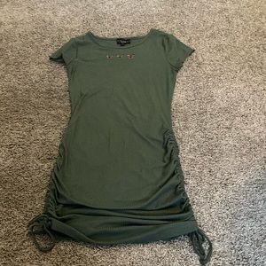 green skin tight dress.